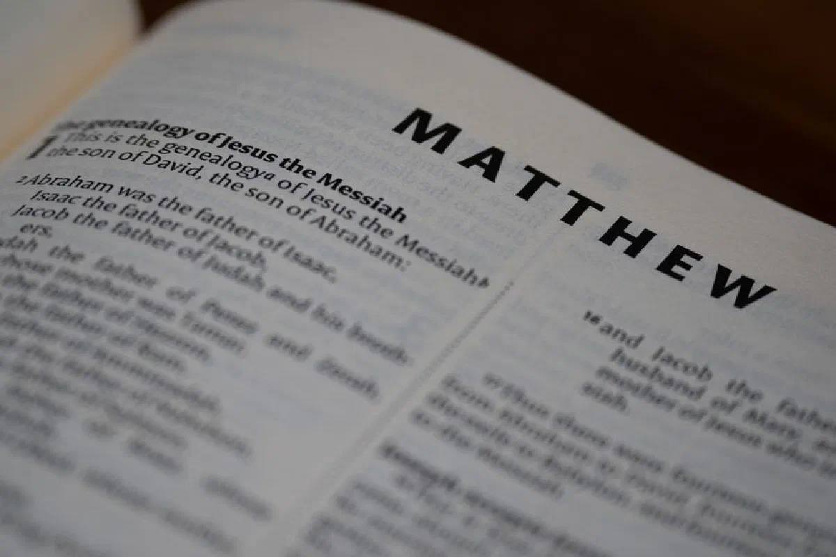 Close-up of the Book of Matthew in an open Bible with selective focus.