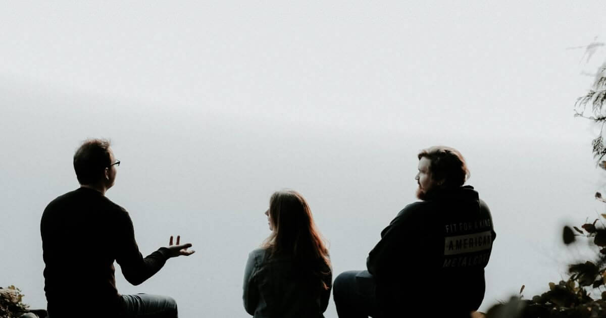 What does the phrase 'where two or three are gathered' mean in Matthew 18:20?