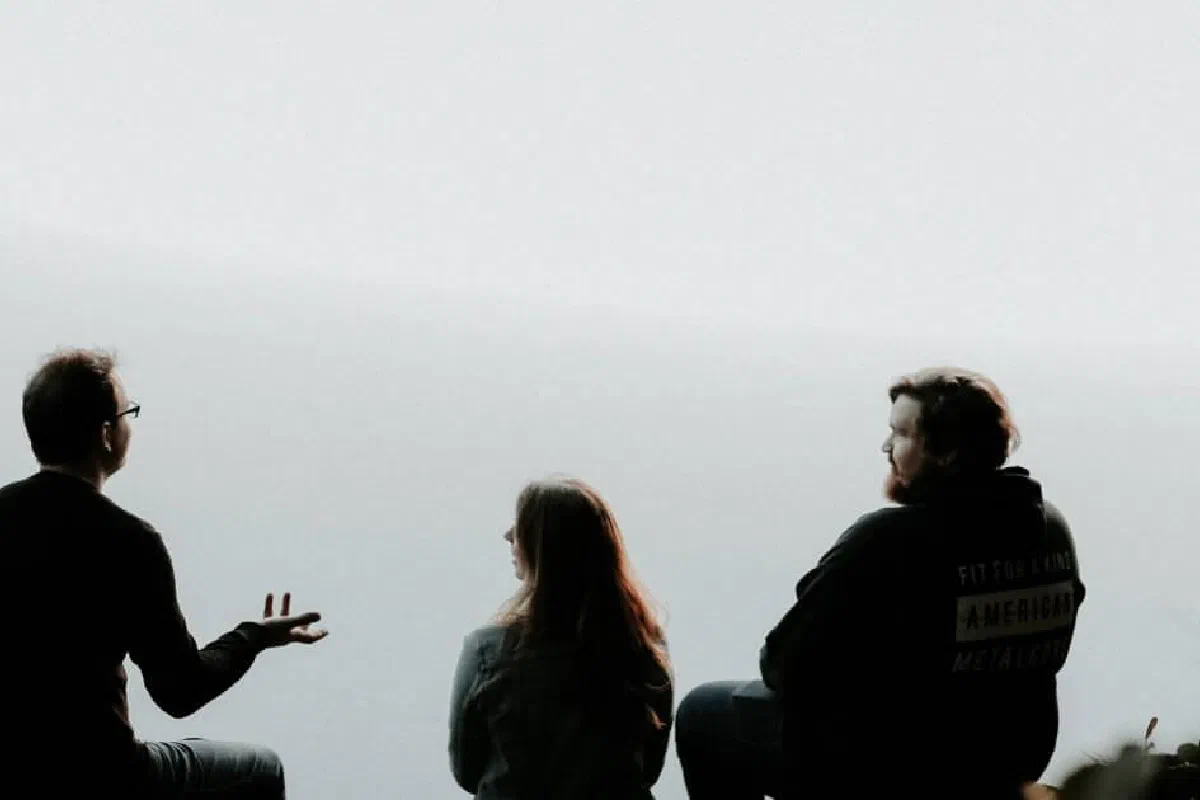 What does the phrase 'where two or three are gathered' mean in Matthew 18:20?