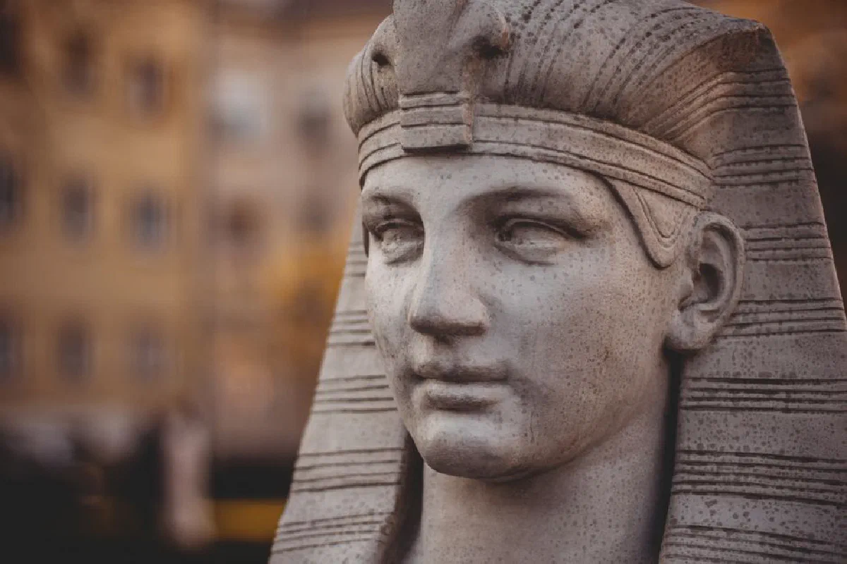 Detailed close-up of a Pharaoh sculpture in Osijek, Croatia with a soft background.