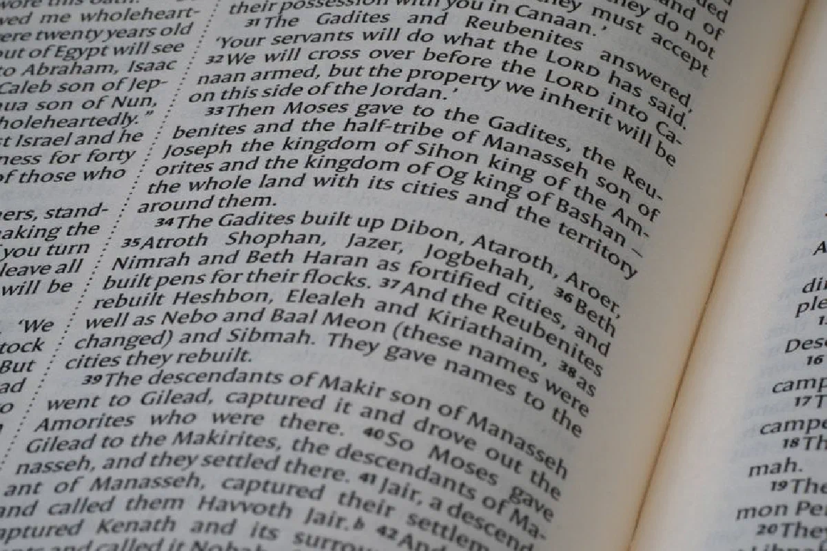 Detailed close-up of an open Bible emphasizing the Book of Numbers text.